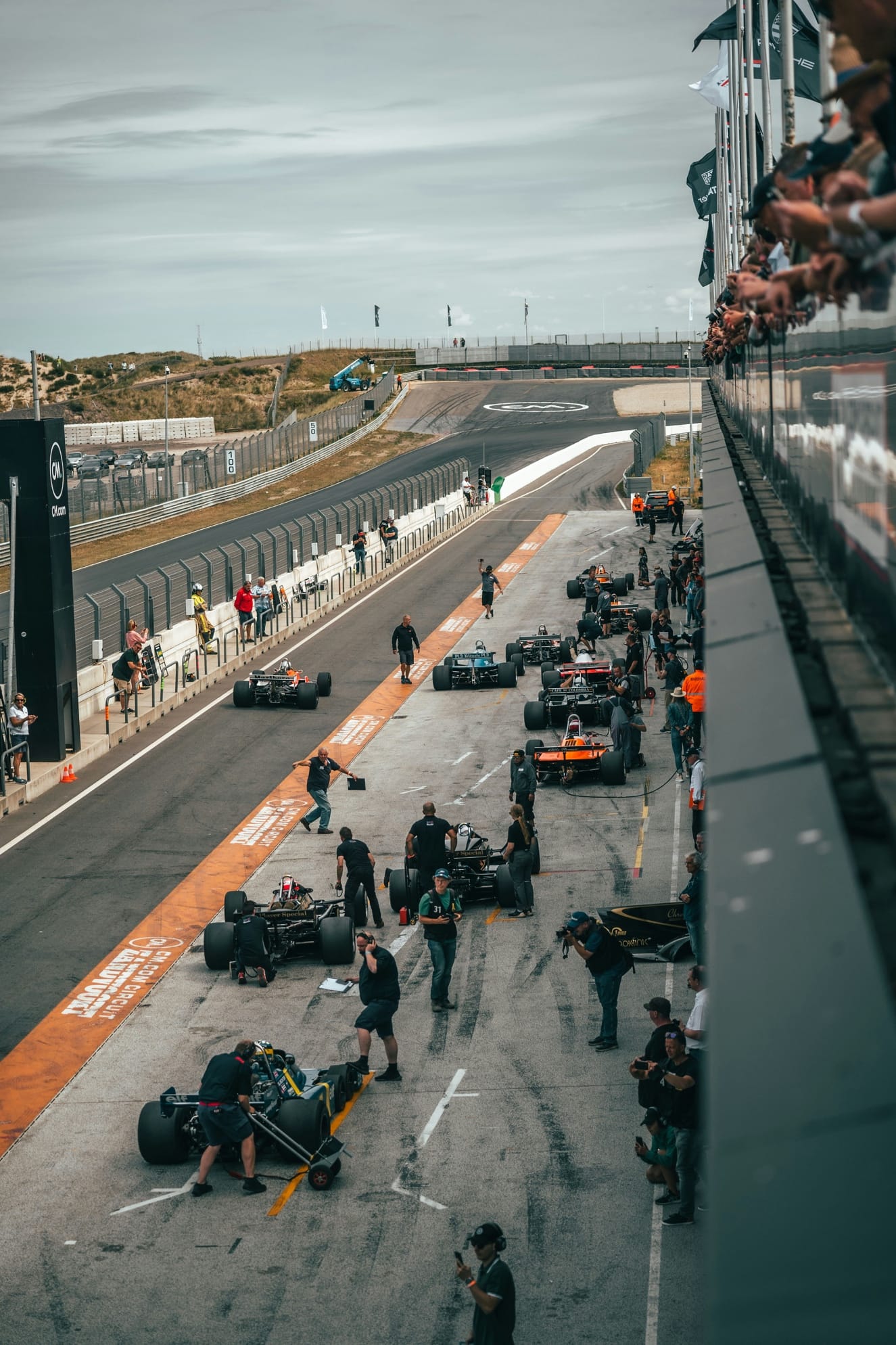A race car on the track

AI-generated content may be incorrect.